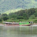 Auf dem Langbot den Mekong rauf